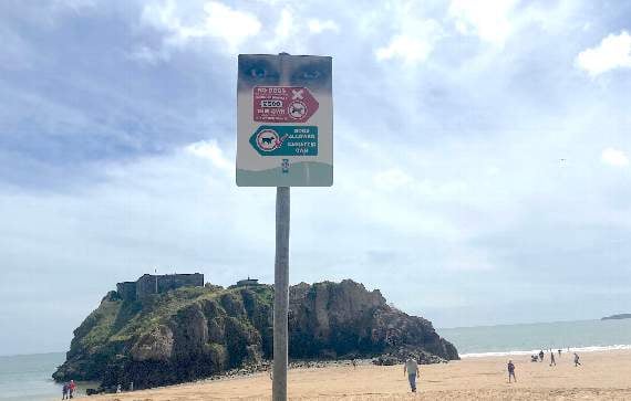 Beach signs are 'not visible enough'