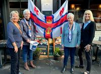 Stall does brisk business at Tenby RNLI coffee morning