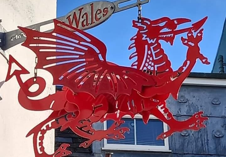 Wales Drago metal sign in Tenby