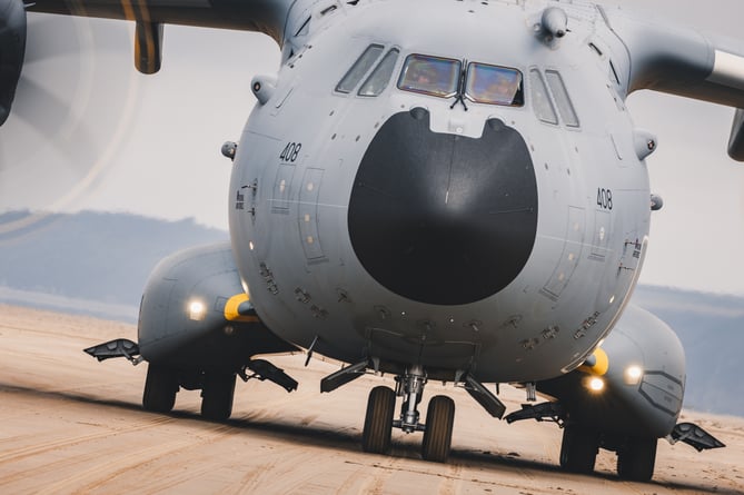 See SWNS story SWNAbeach. How's this for a day at the beach? Huge military transport planes have been spotted landing on Pembrey Sands in West Wales. The RAF Atlas A400Ms have been carrying out beach landing training at the coastal spot this week. They also practiced the insertion of so-called pathfinders, specialised soldiers dropped into place in order to set up and operate drop zones. Incredible pictures show the crews of the Brize Norton-based LXX and 30 Squadrons carrying out the objectives.