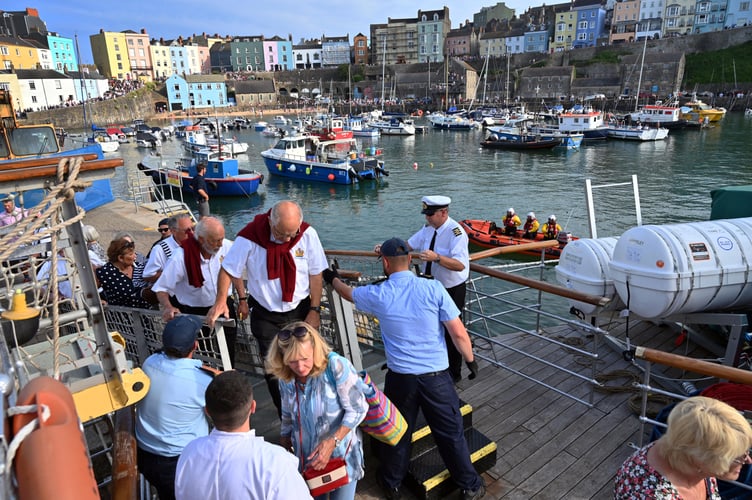 Tenby Male Choir members boarding Waverley paddle steamer at Tenby