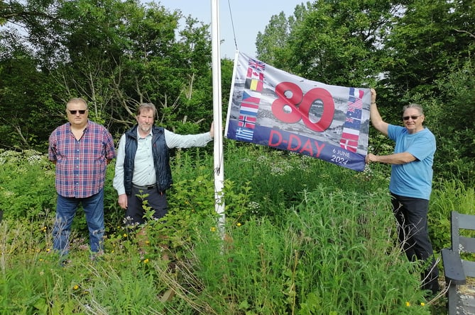 East Williamston Community Councillors Ian Wilkinson, Doug McIntosh and Dr Pete Strydom (chair) with the ‘D-Day 80 - Flag of Peace’