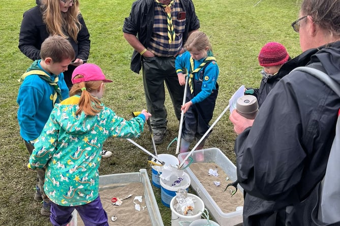 Litter picking race at Sea Trust Scouts event, Picton Castle