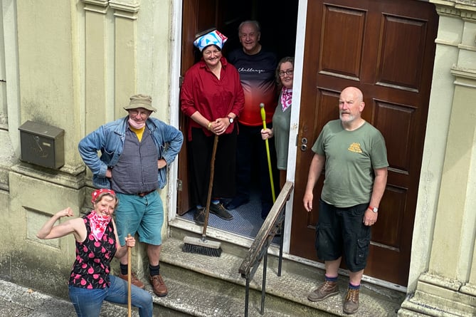 Haverfordwest Printmakers Circle work party prepare to open the hall for a public preview before renovation works begin